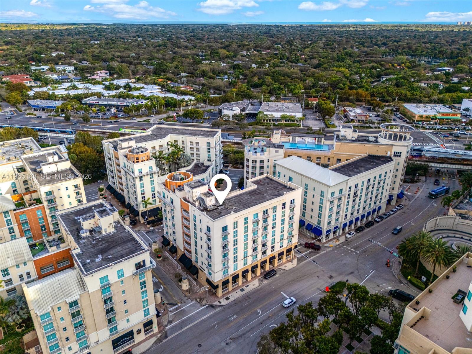 7290 Southwest 90th Street, Unit 209 Miami, FL 33156 - Photo 8 of 40 an aerial view of a house with a garden