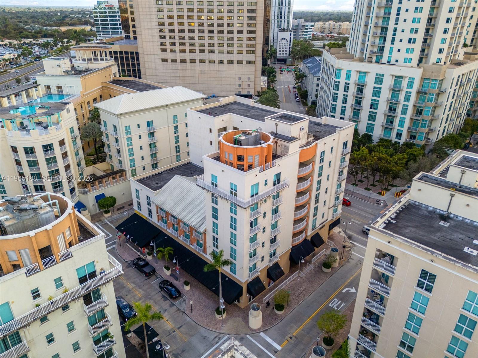 7290 Southwest 90th Street, Unit 209 Miami, FL 33156 - Photo 9 of 40 a view of a balcony with an outdoor space