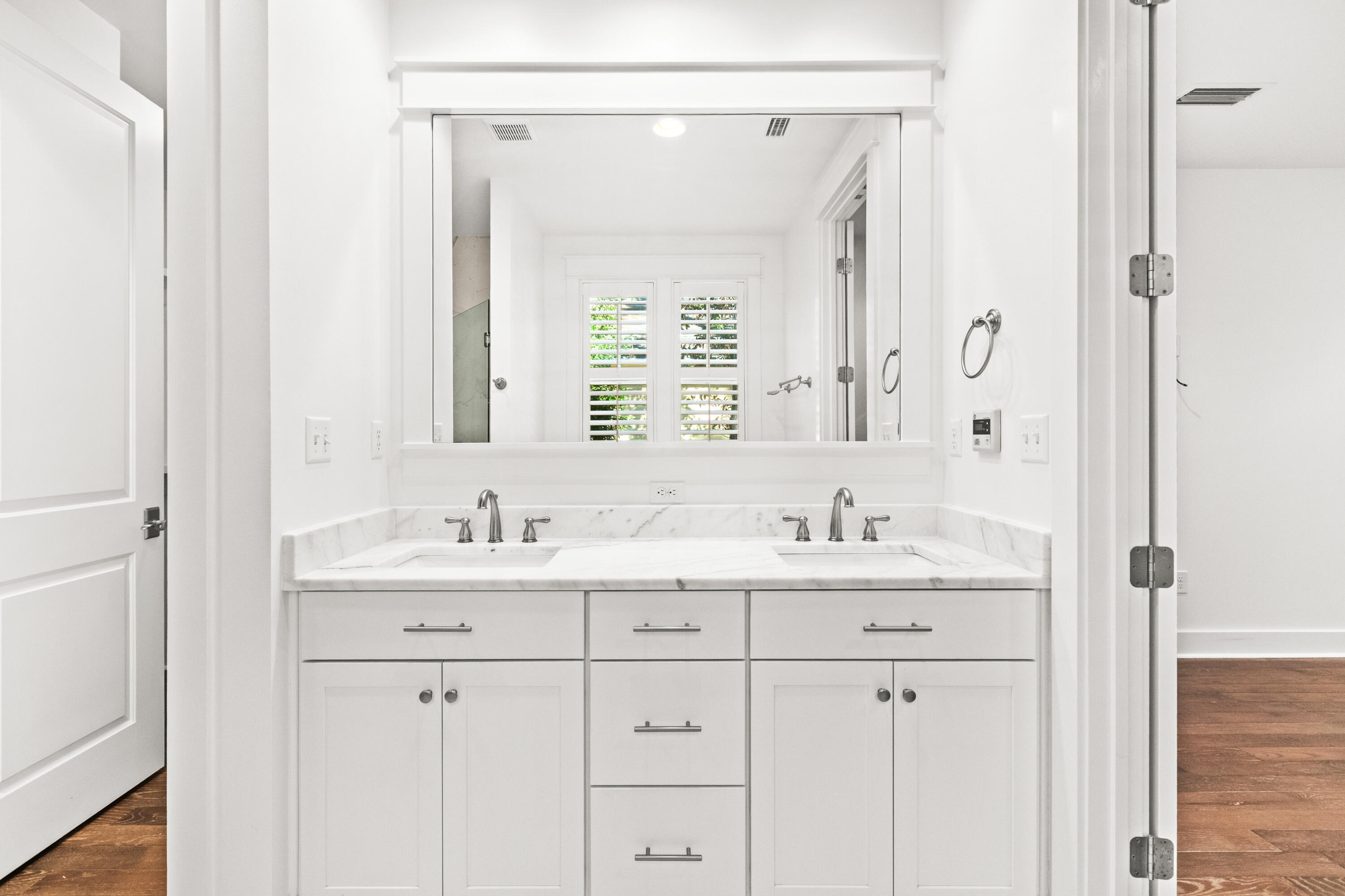 309 Jack Knife Drive Inlet Beach, FL 32461 - Photo 12 of 43 a bathroom with double sink and a mirror