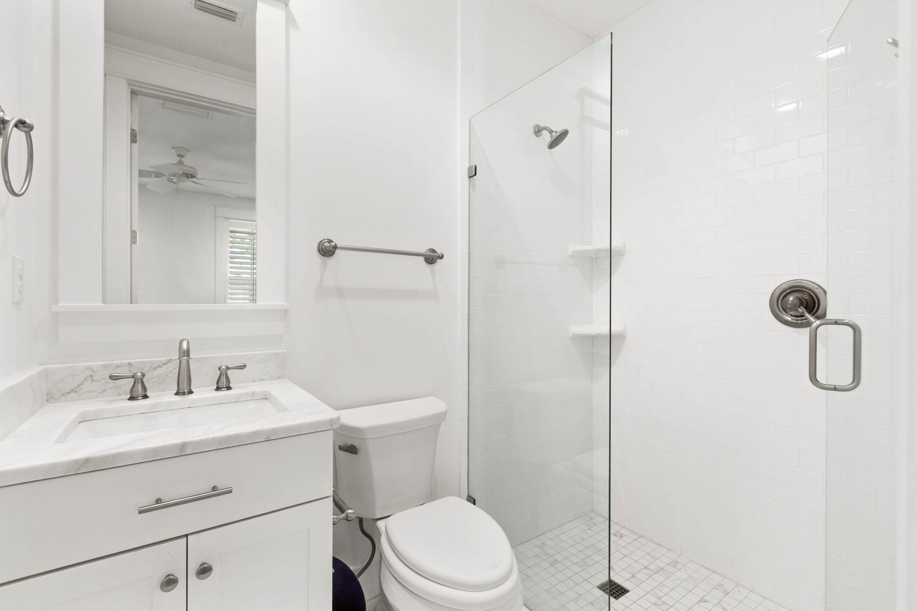 309 Jack Knife Drive Inlet Beach, FL 32461 - Photo 19 of 43 a bathroom with a sink a toilet and shower