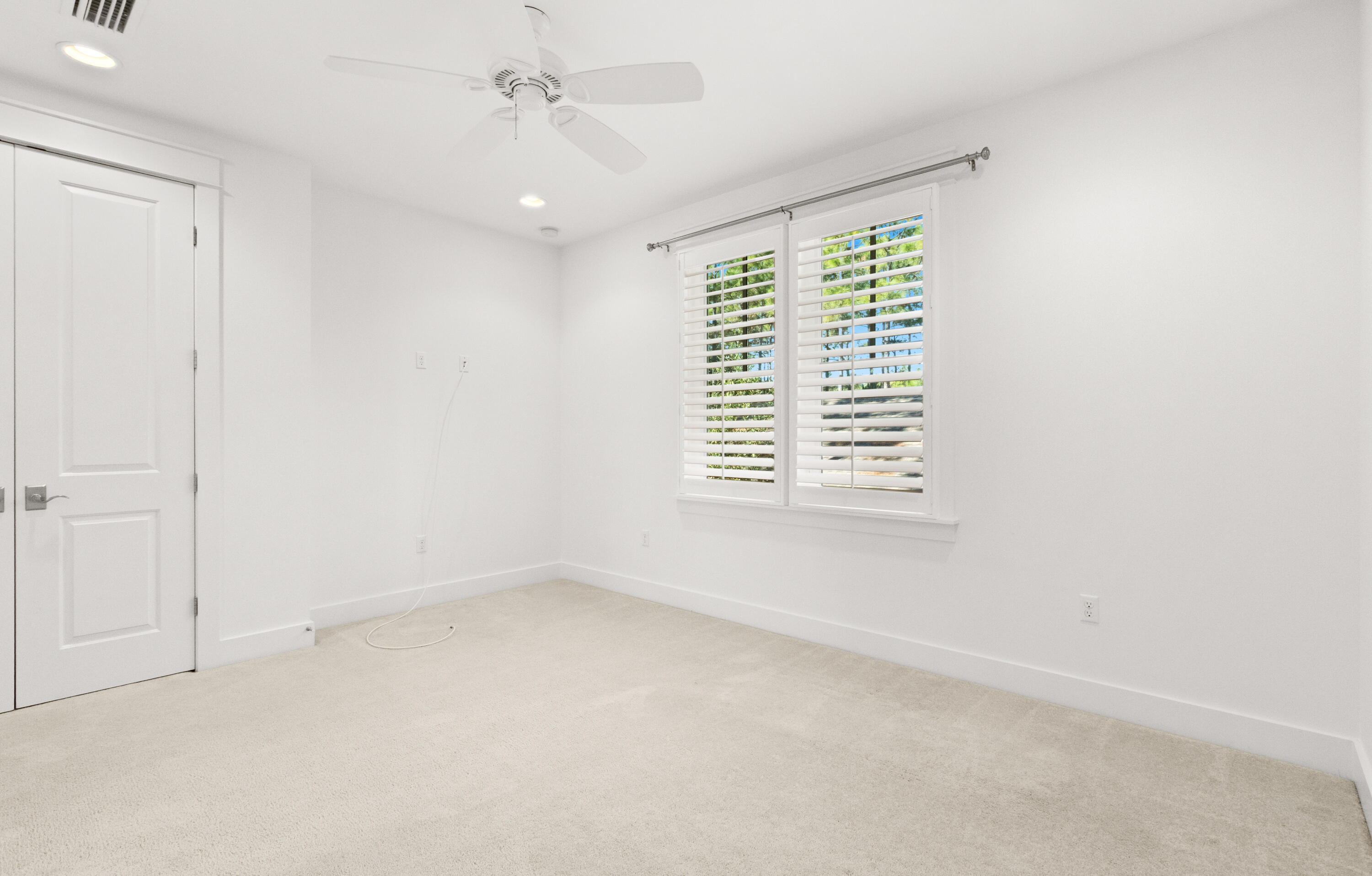 309 Jack Knife Drive Inlet Beach, FL 32461 - Photo 26 of 43 an empty room with windows and fan