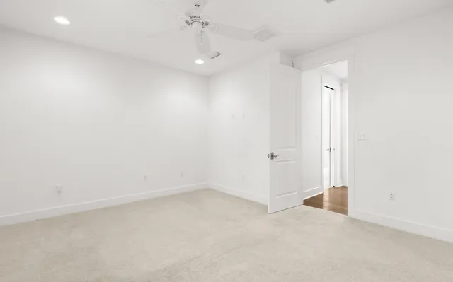 a living room with a fireplace and a flat screen tv