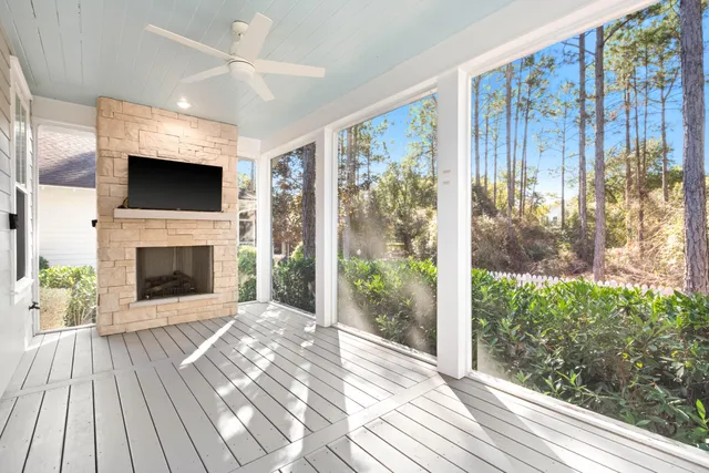 a view of a room with a large window