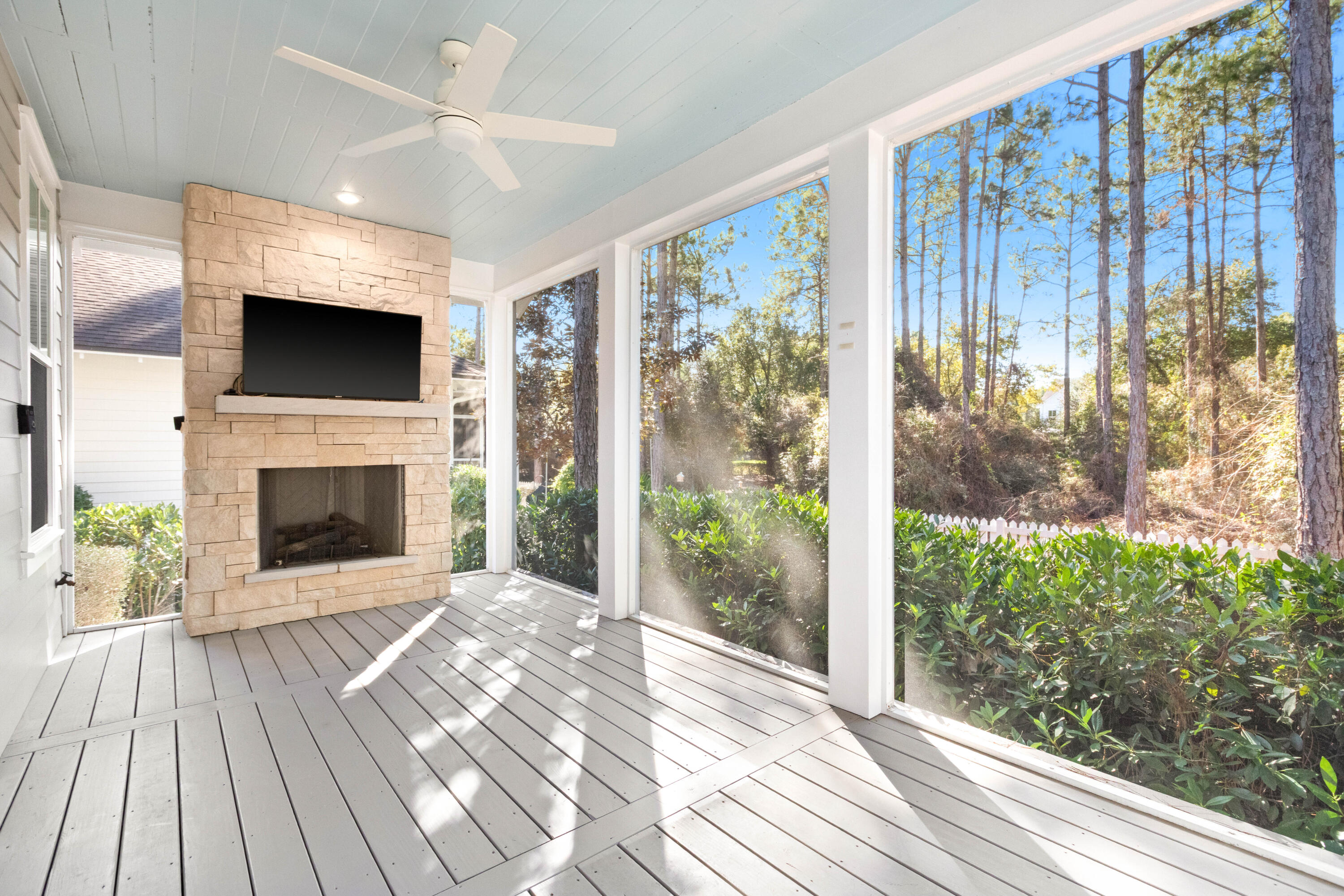 309 Jack Knife Drive Inlet Beach, FL 32461 - Photo 28 of 43 a living room with a fireplace and a flat screen tv