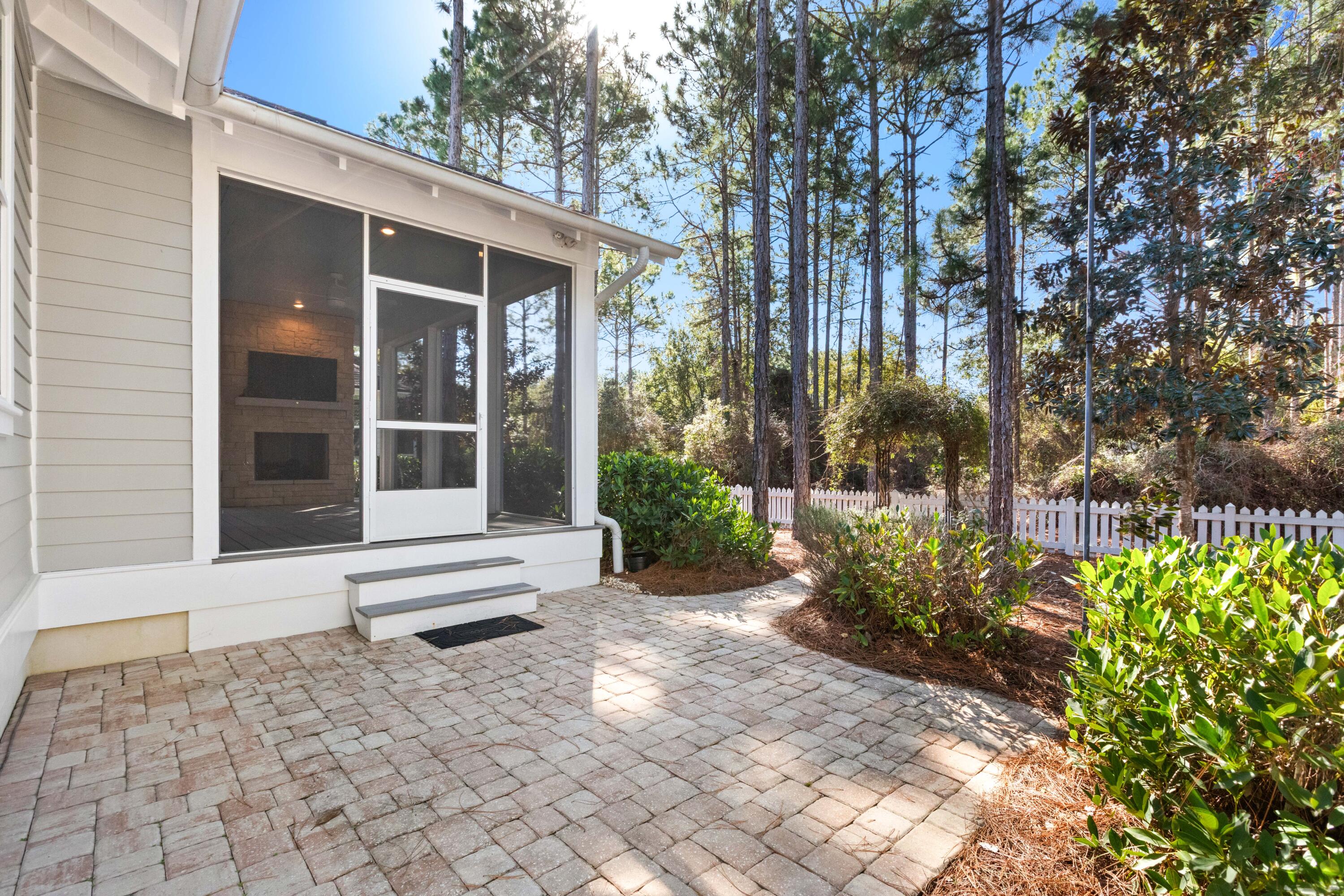 309 Jack Knife Drive Inlet Beach, FL 32461 - Photo 31 of 43 a view of a house with a yard and plants