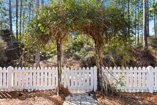 a view of a bench in a garden