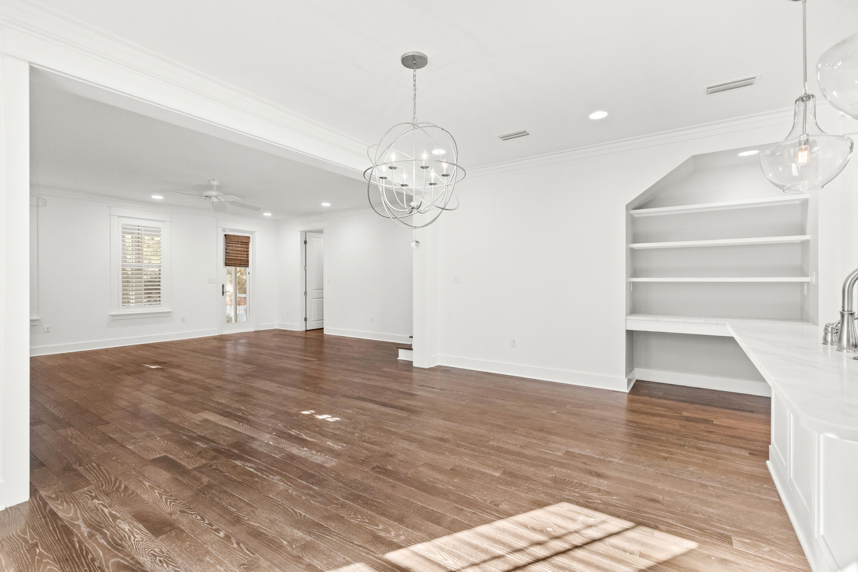 309 Jack Knife Drive Inlet Beach, FL 32461 - Photo 6 of 43 a view of a room with wooden floor and white walls