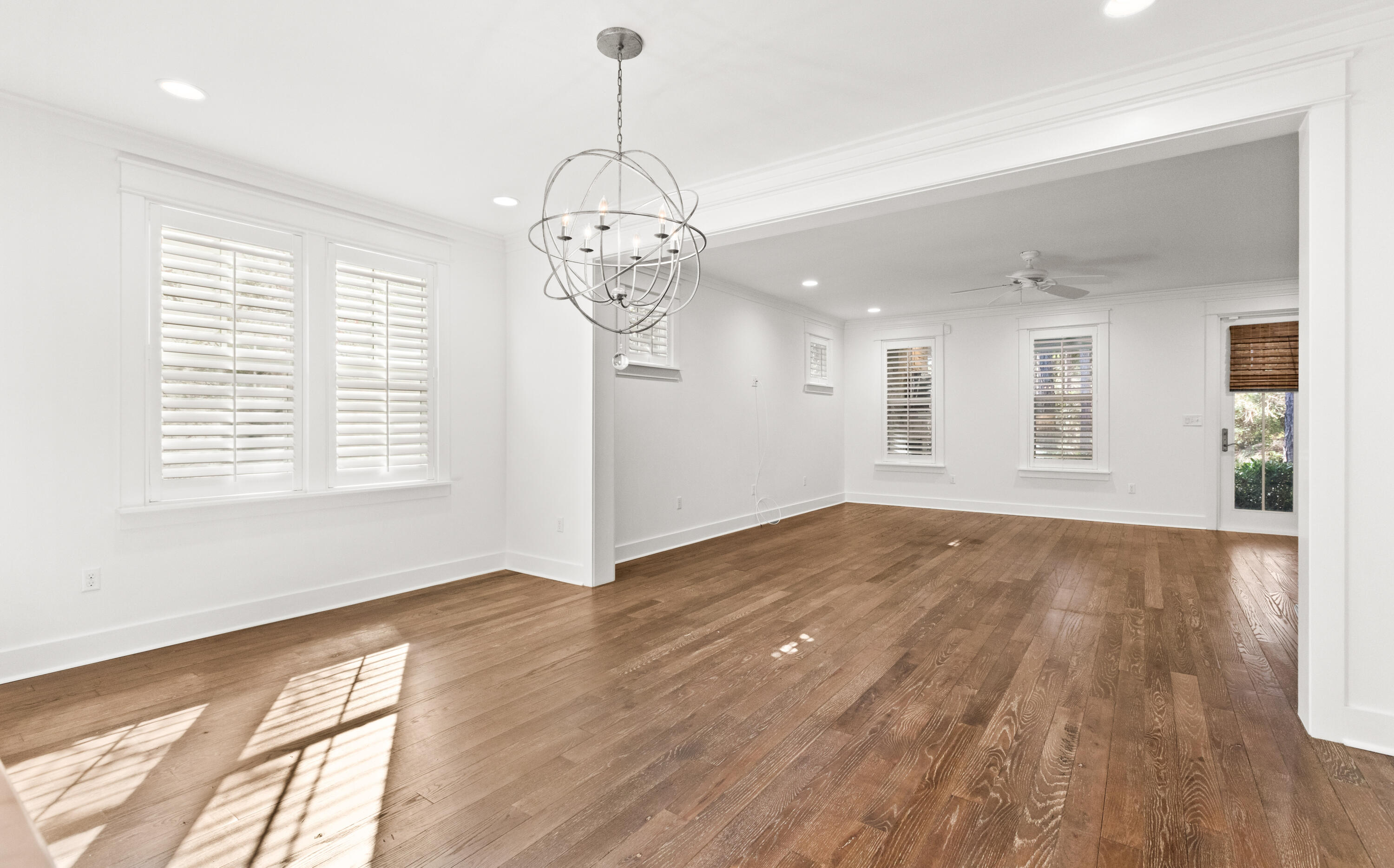 309 Jack Knife Drive Inlet Beach, FL 32461 - Photo 7 of 43 a view of an empty room with wooden floor and a window