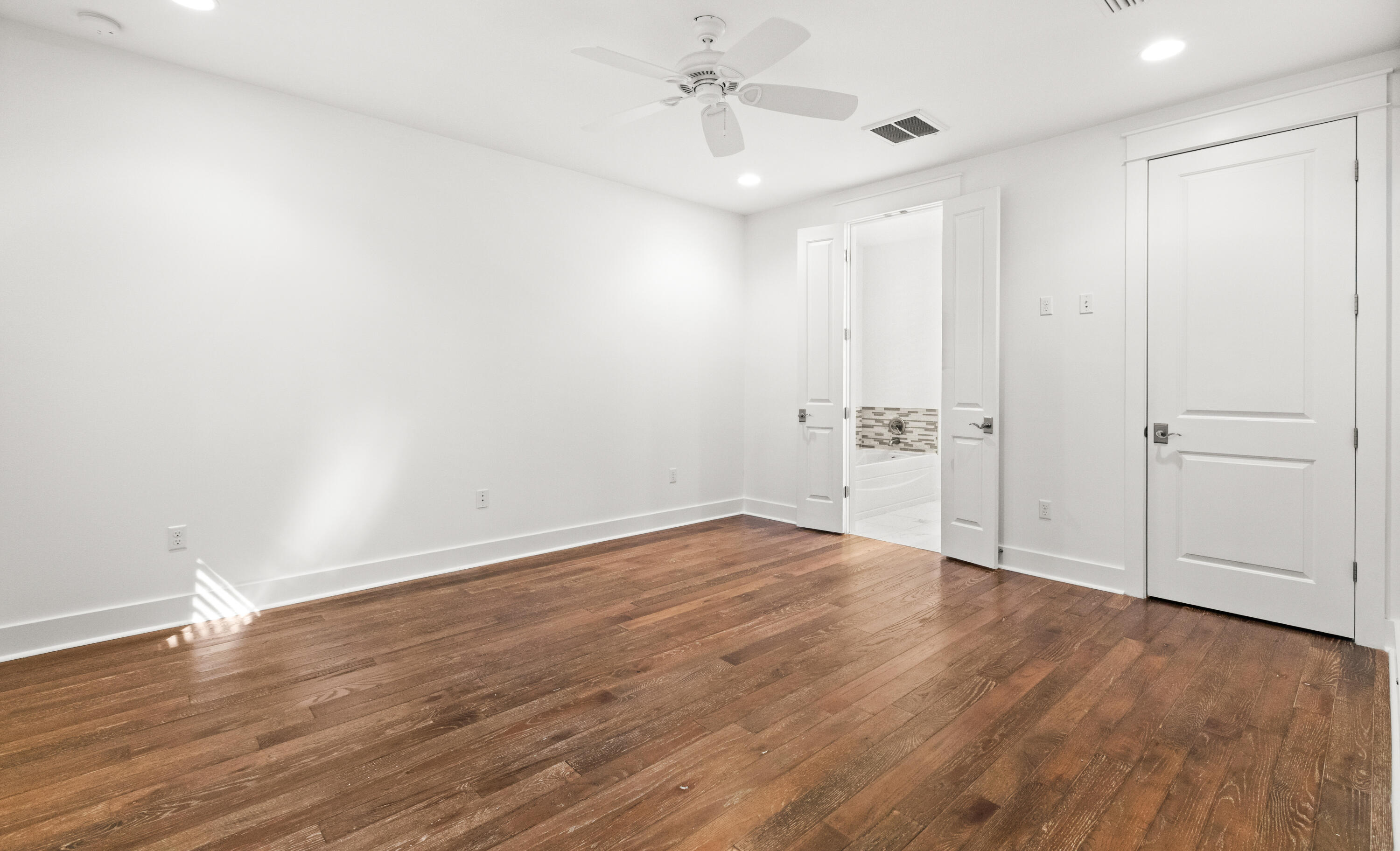 309 Jack Knife Drive Inlet Beach, FL 32461 - Photo 10 of 43 a view of an empty room with wooden floor