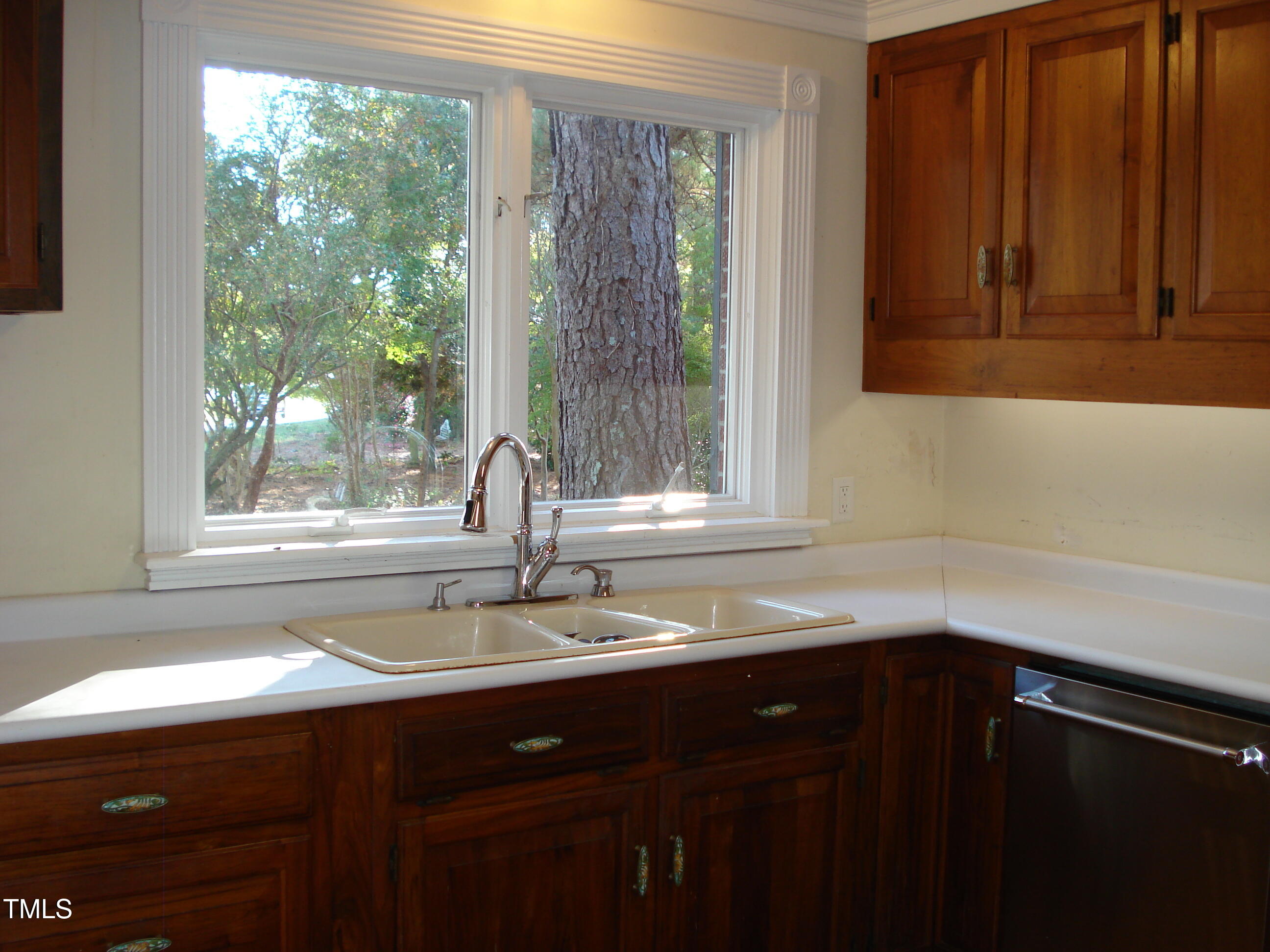 6349 Elevation Road Benson, NC 27504 - Photo 28 of 66 a kitchen with a sink and a window