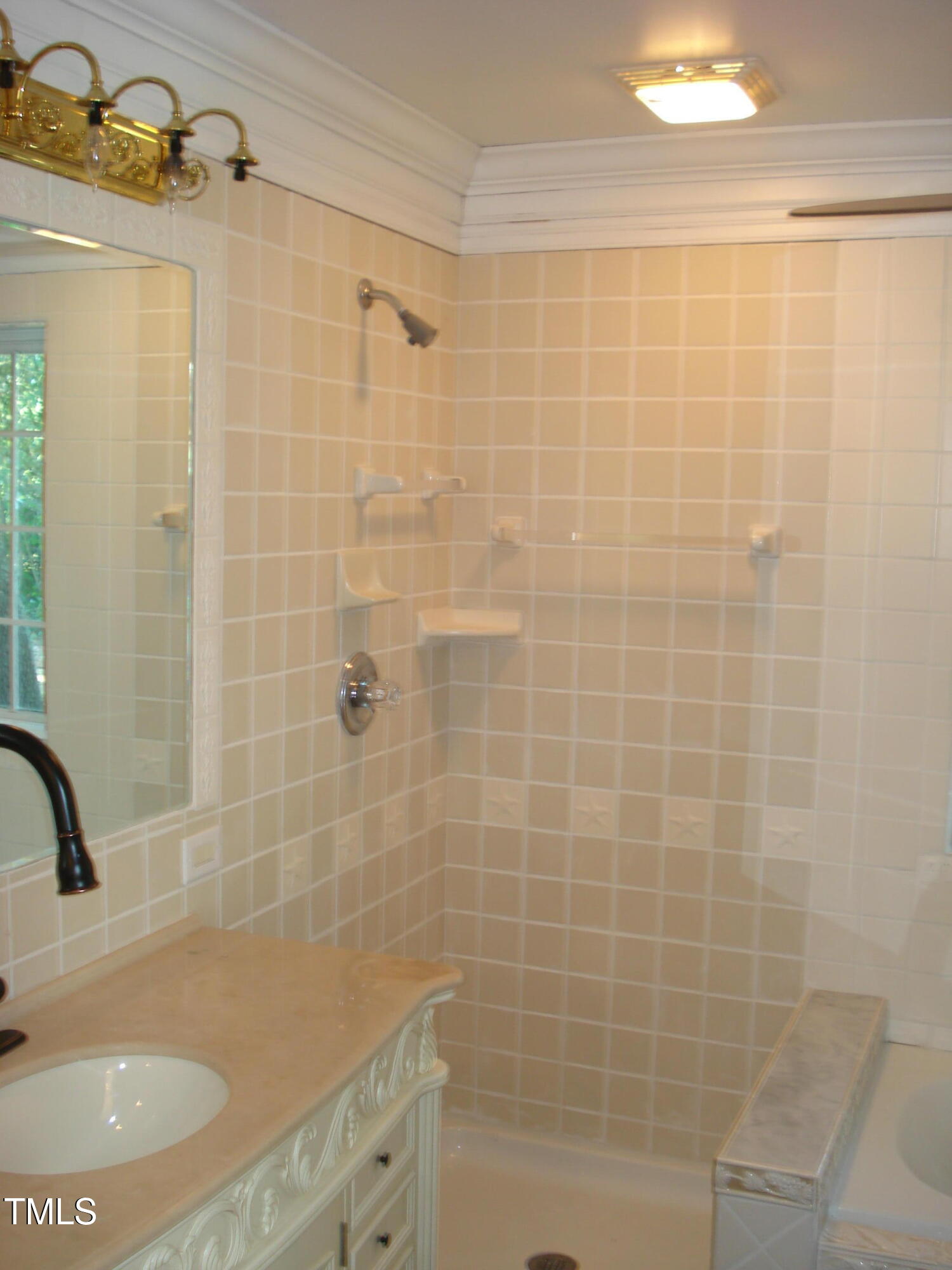6349 Elevation Road Benson, NC 27504 - Photo 34 of 66 a bathroom with a shower and a sink