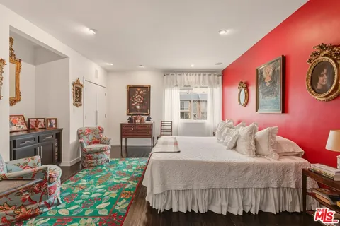 a bathroom with a tub and shower