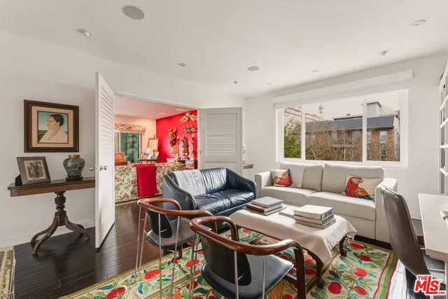 a view of a livingroom with furniture and wooden floor
