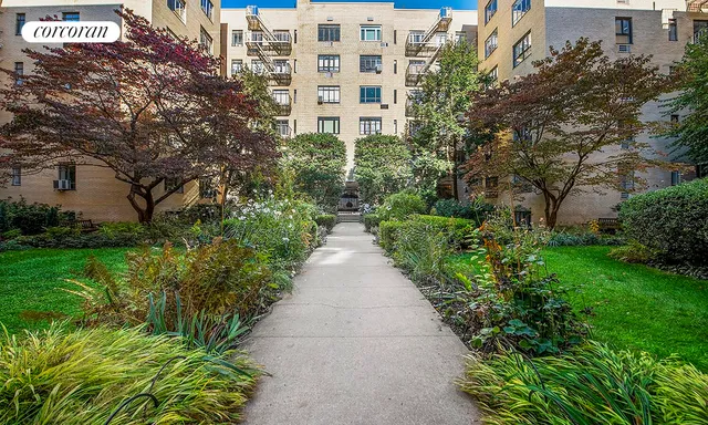 a view of a pathway with a building in the background