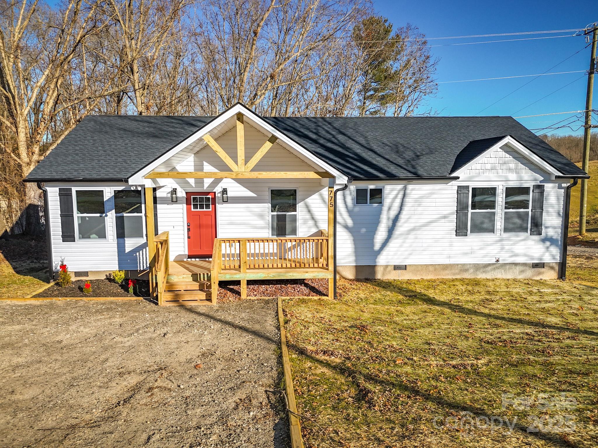 775 Olivette Road Asheville, NC 28804 - Photo 1 of 45 a house with pool in front of it