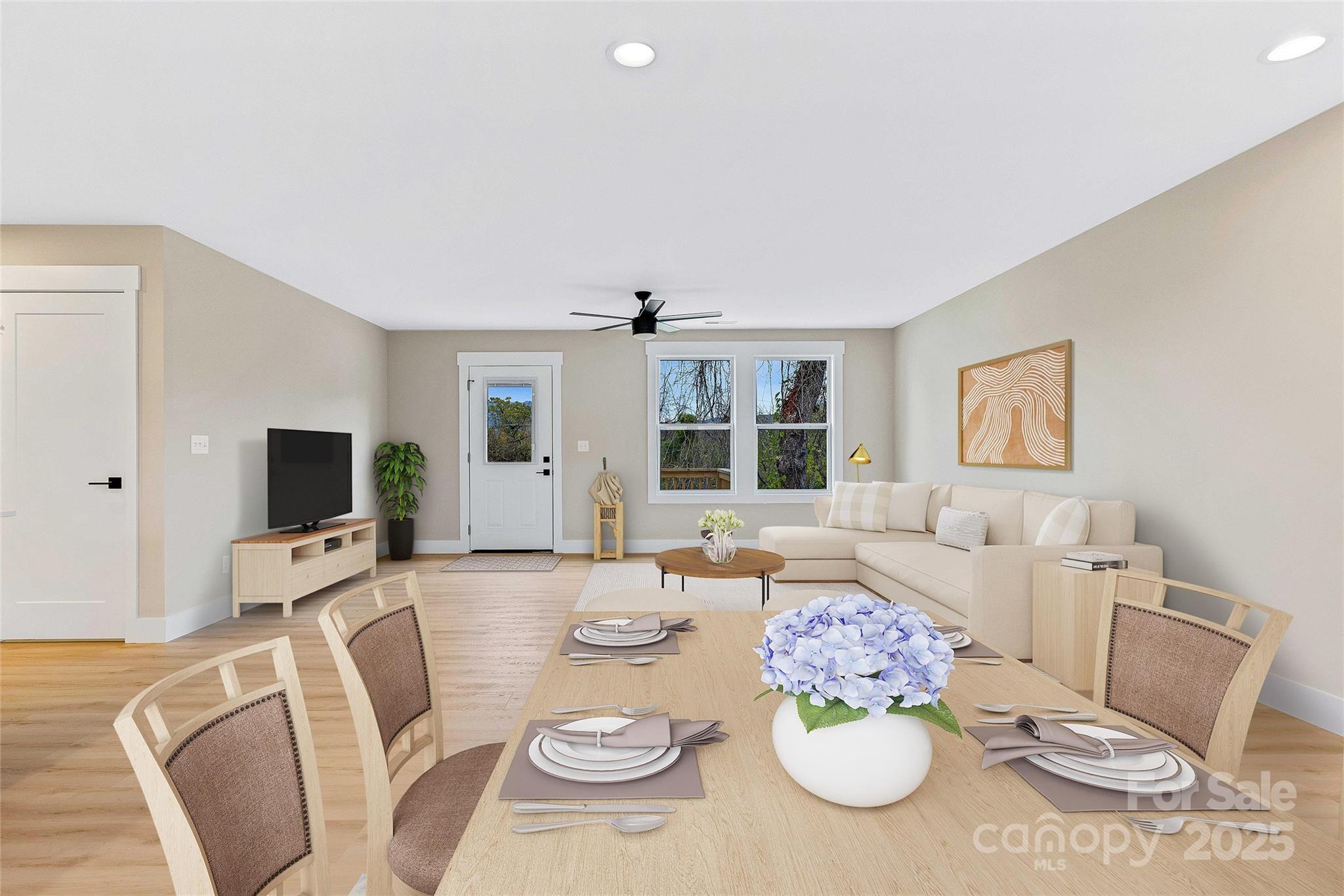 775 Olivette Road Asheville, NC 28804 - Photo 12 of 45 a view of a dining room with furniture a rug and wooden floor