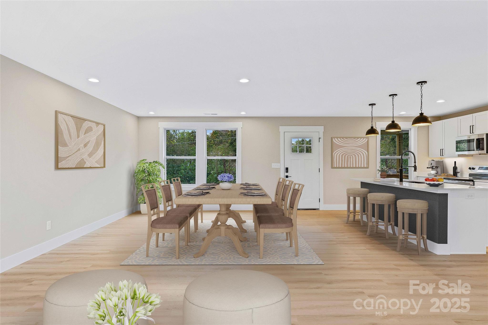 775 Olivette Road Asheville, NC 28804 - Photo 16 of 45 a view of a dining room with furniture window and wooden floor
