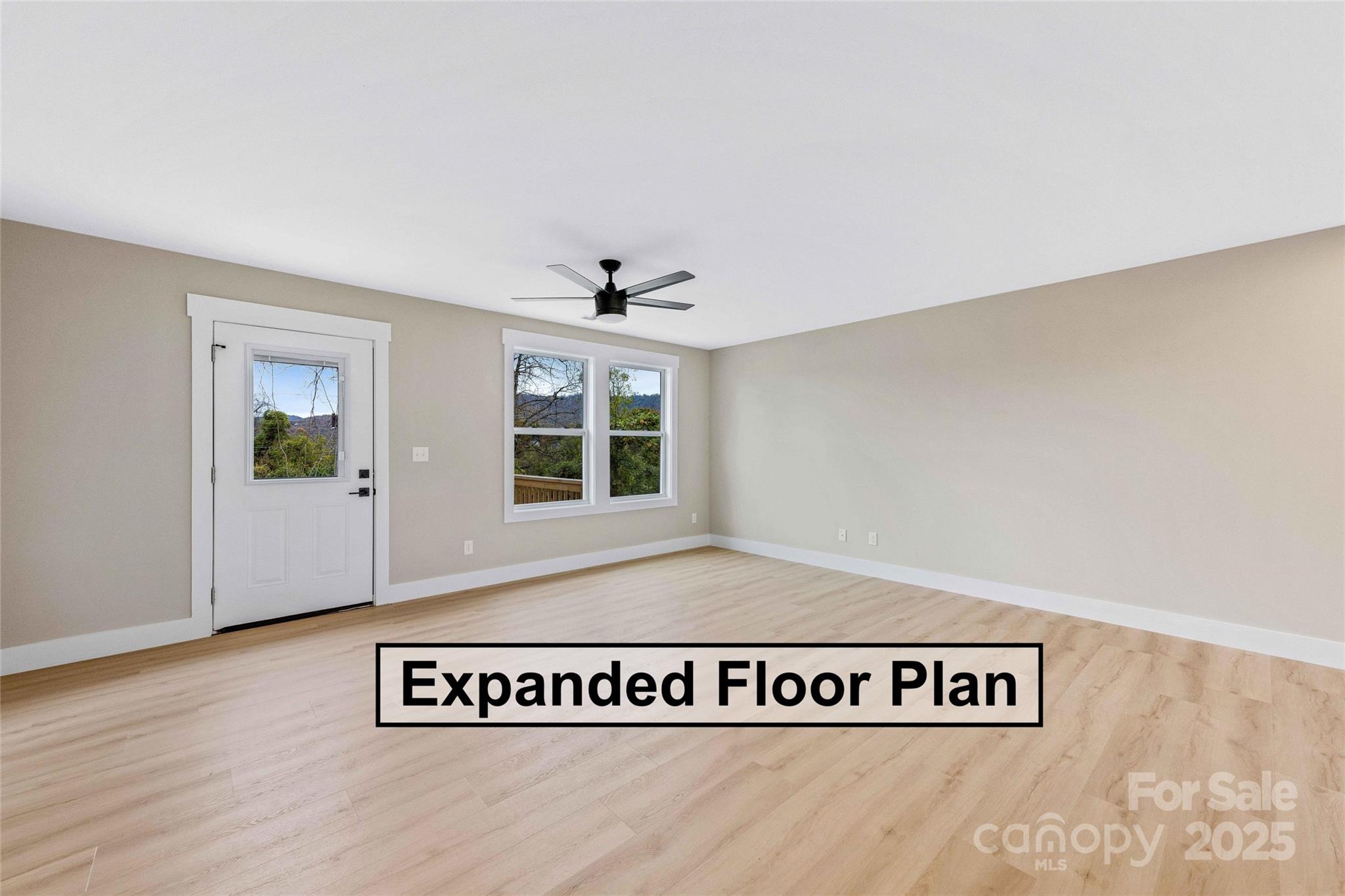 775 Olivette Road Asheville, NC 28804 - Photo 17 of 45 a view of a kitchen with wooden floor and window