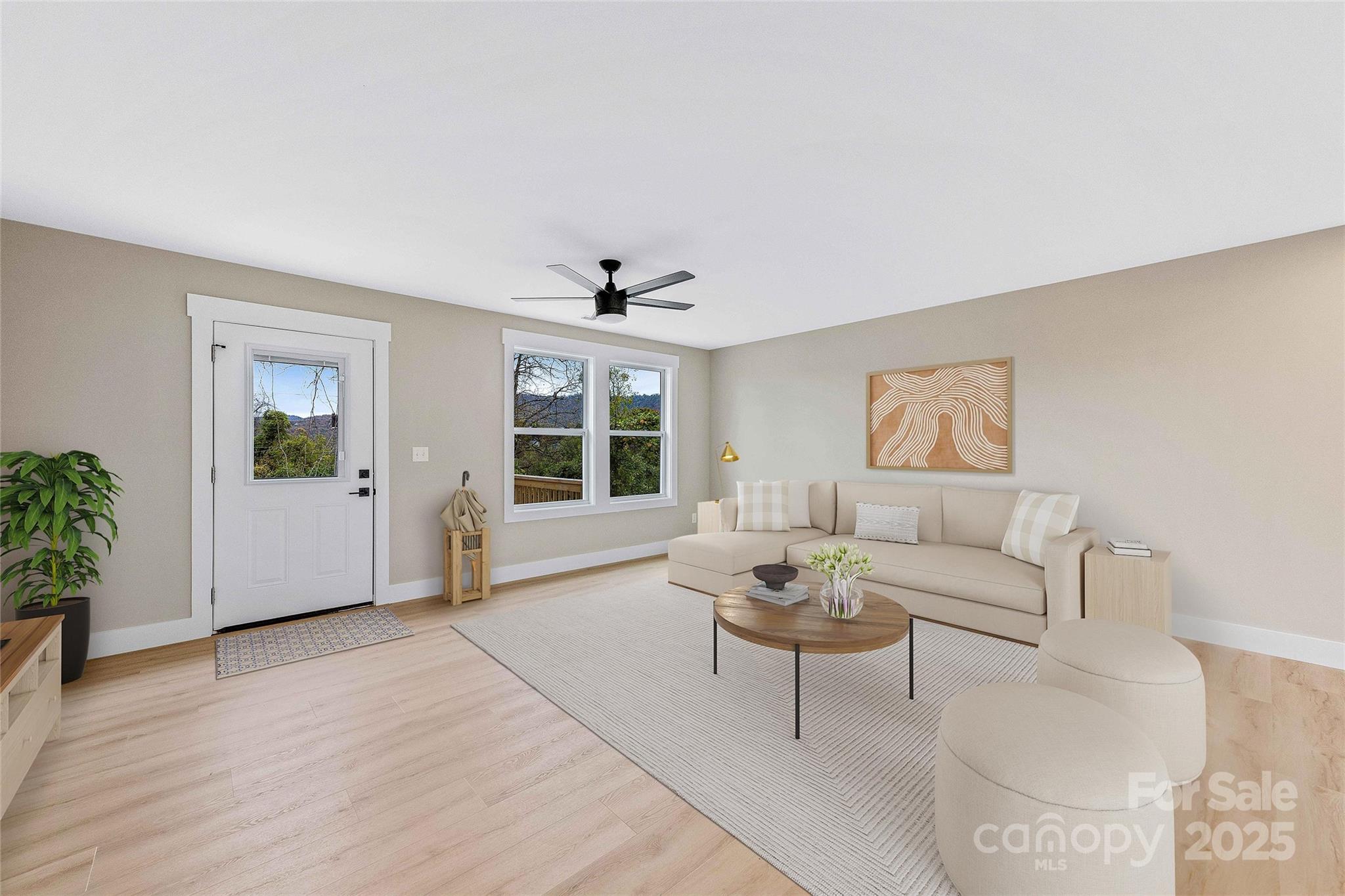 775 Olivette Road Asheville, NC 28804 - Photo 18 of 45 a living room with furniture and a large window