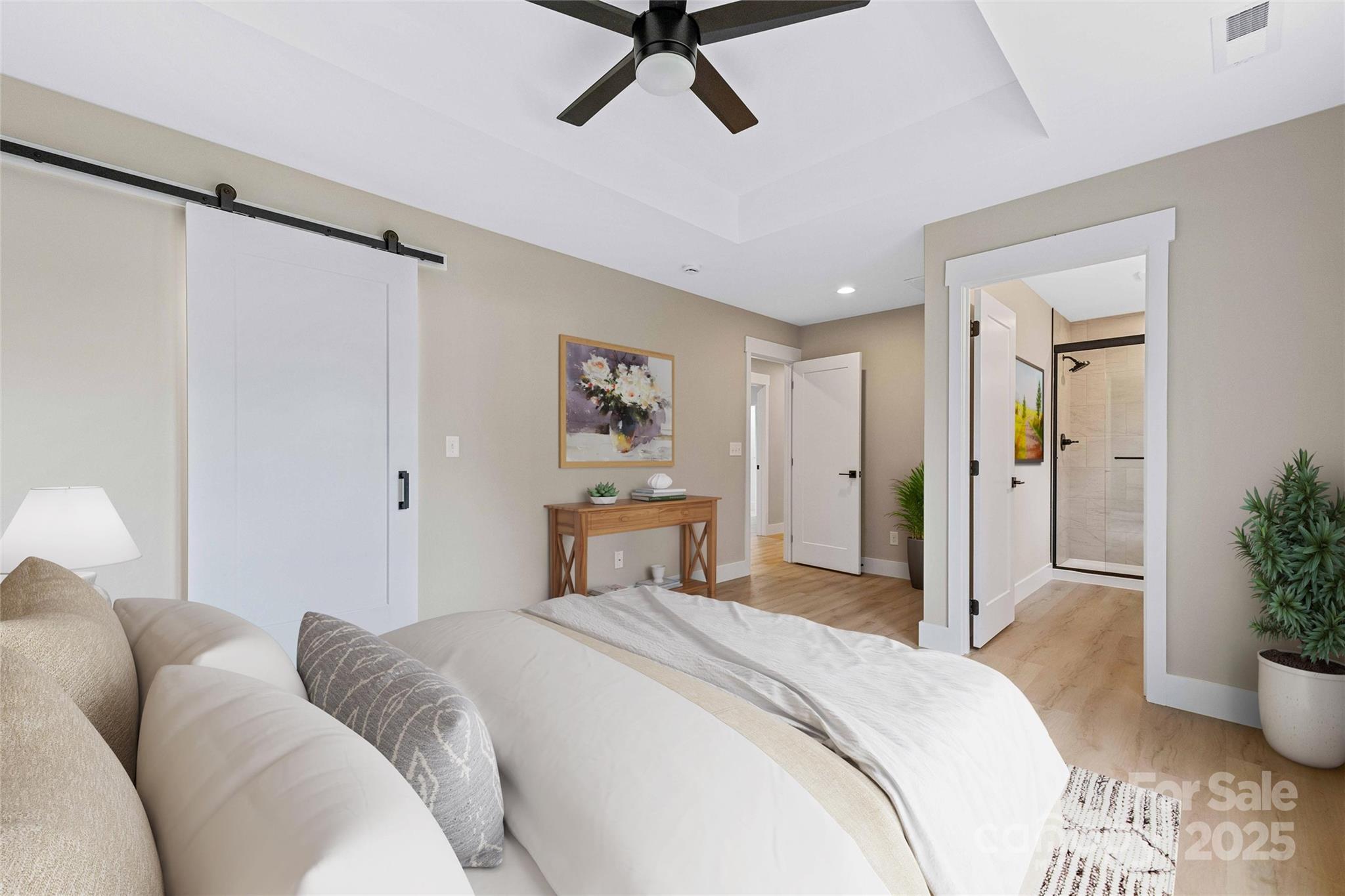 775 Olivette Road Asheville, NC 28804 - Photo 27 of 45 a bedroom with a large bed and furniture