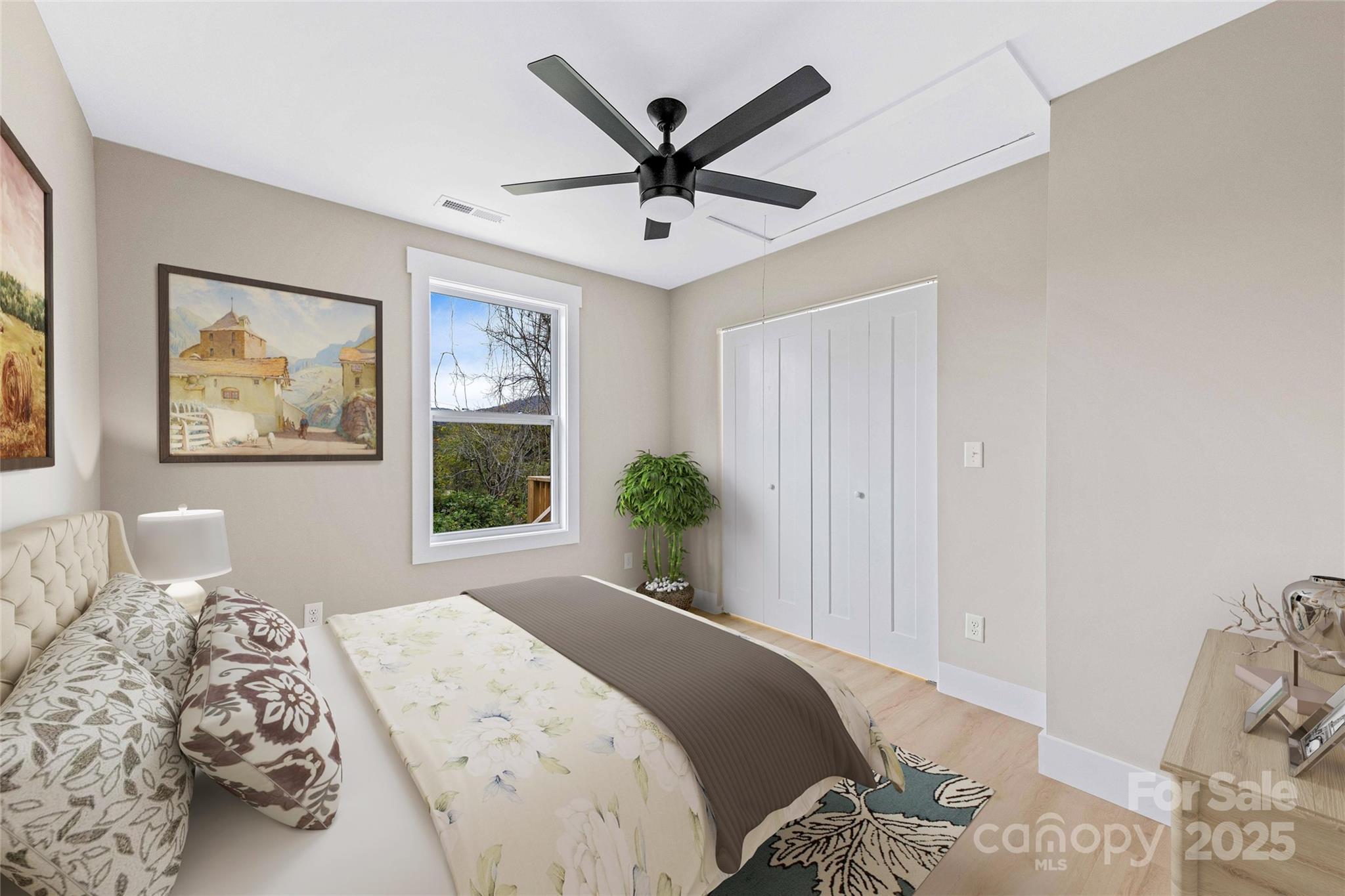 775 Olivette Road Asheville, NC 28804 - Photo 34 of 45 a bedroom with a large bed and a window