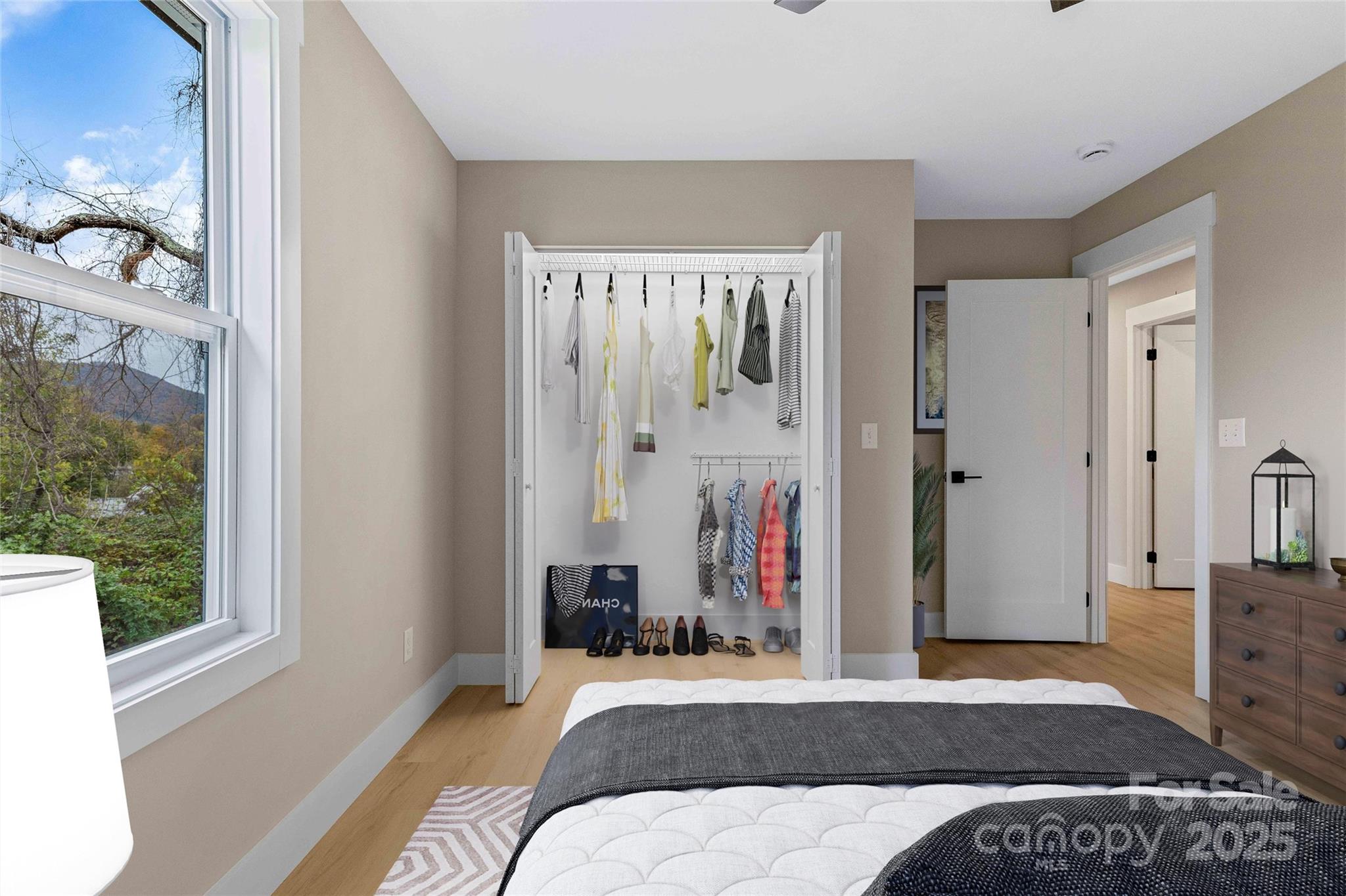 775 Olivette Road Asheville, NC 28804 - Photo 42 of 45 a bedroom with a bed and a window