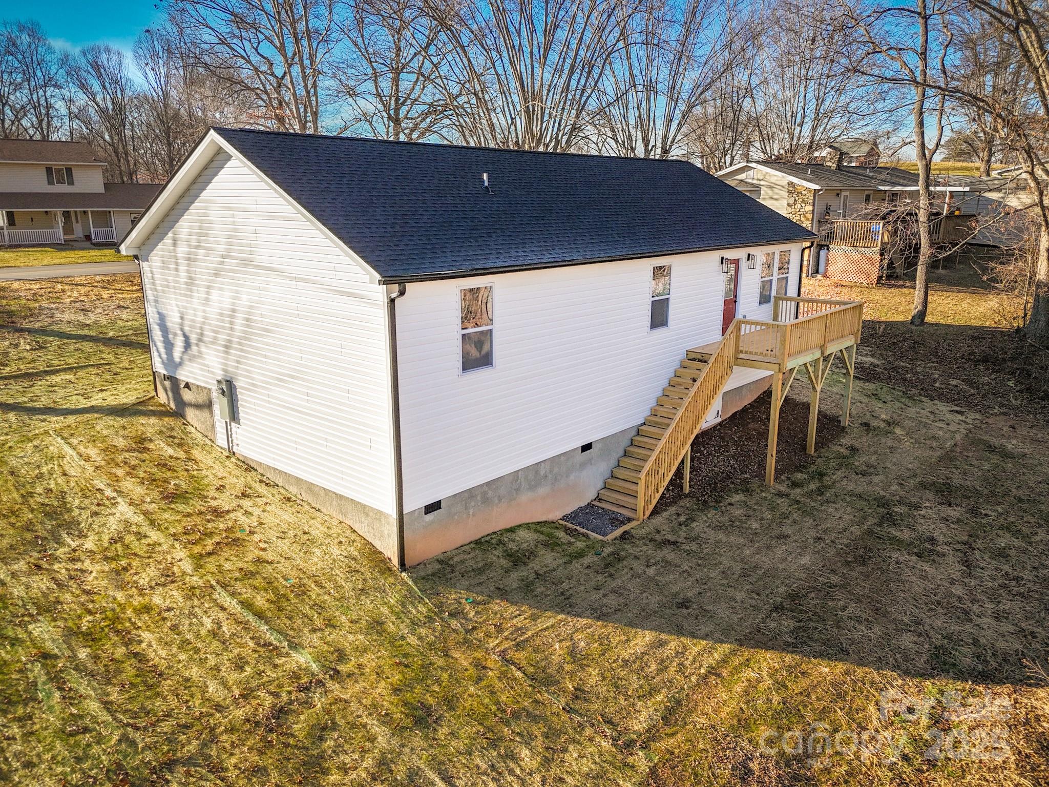 775 Olivette Road Asheville, NC 28804 - Photo 6 of 45 a view of a house with backyard