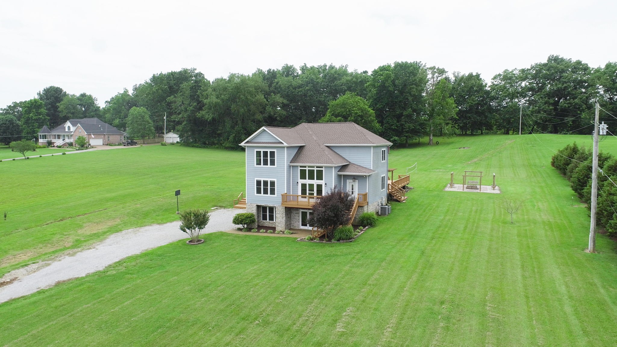 447 Ranch Road Portland, TN 37148 - Photo 2 of 27 a view of a house with a big yard