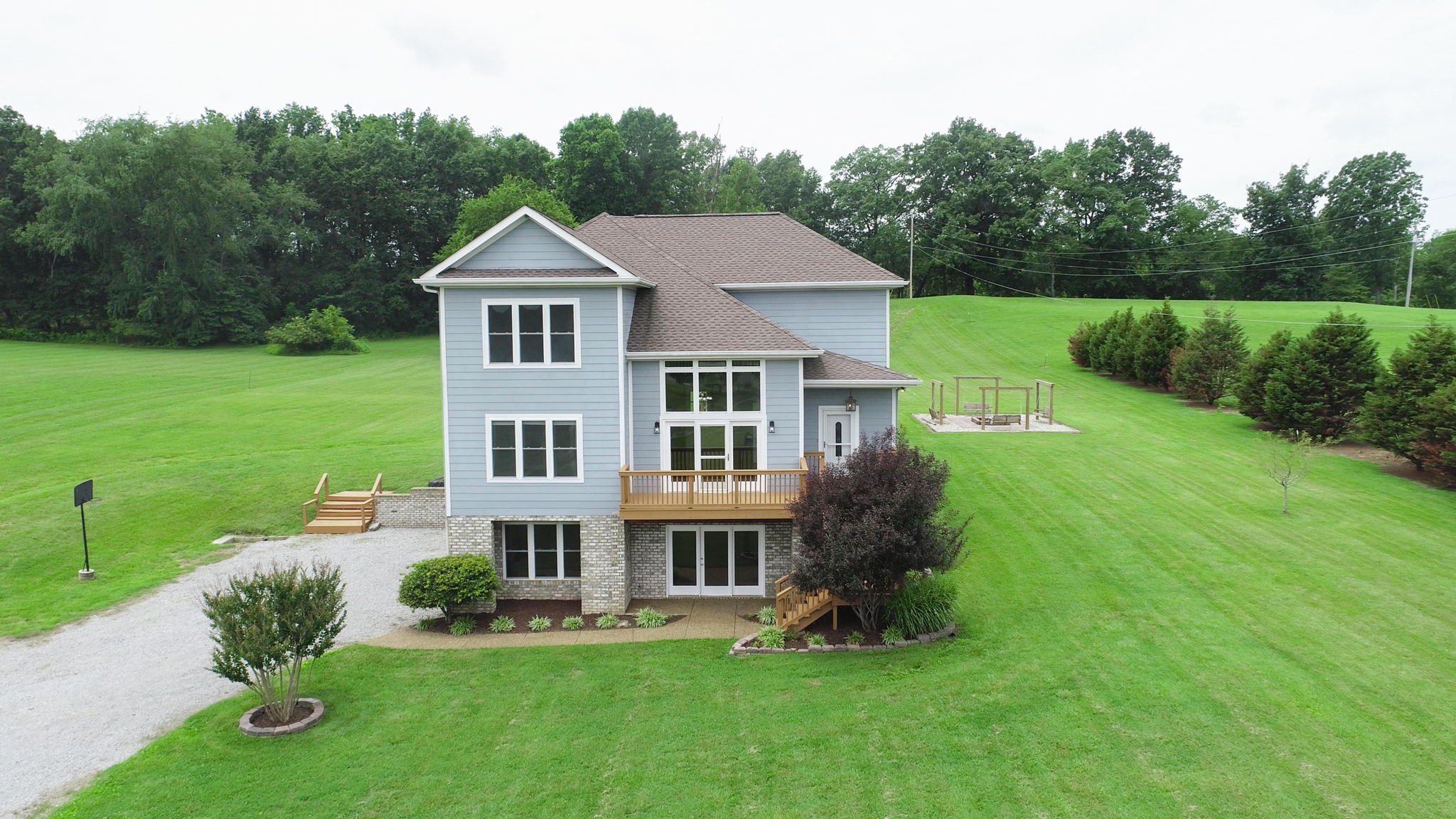 447 Ranch Road Portland, TN 37148 - Photo 3 of 27 a front view of house with yard and green space