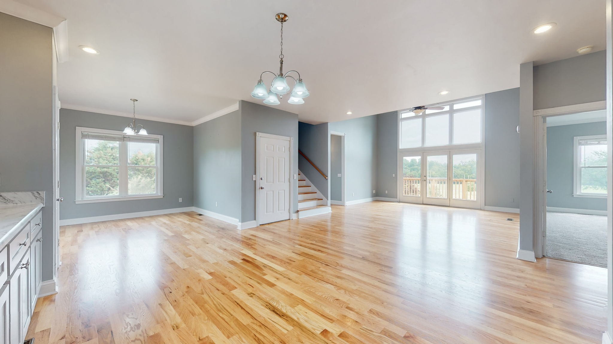 447 Ranch Road Portland, TN 37148 - Photo 6 of 27 a view of an empty room with wooden floor and a window