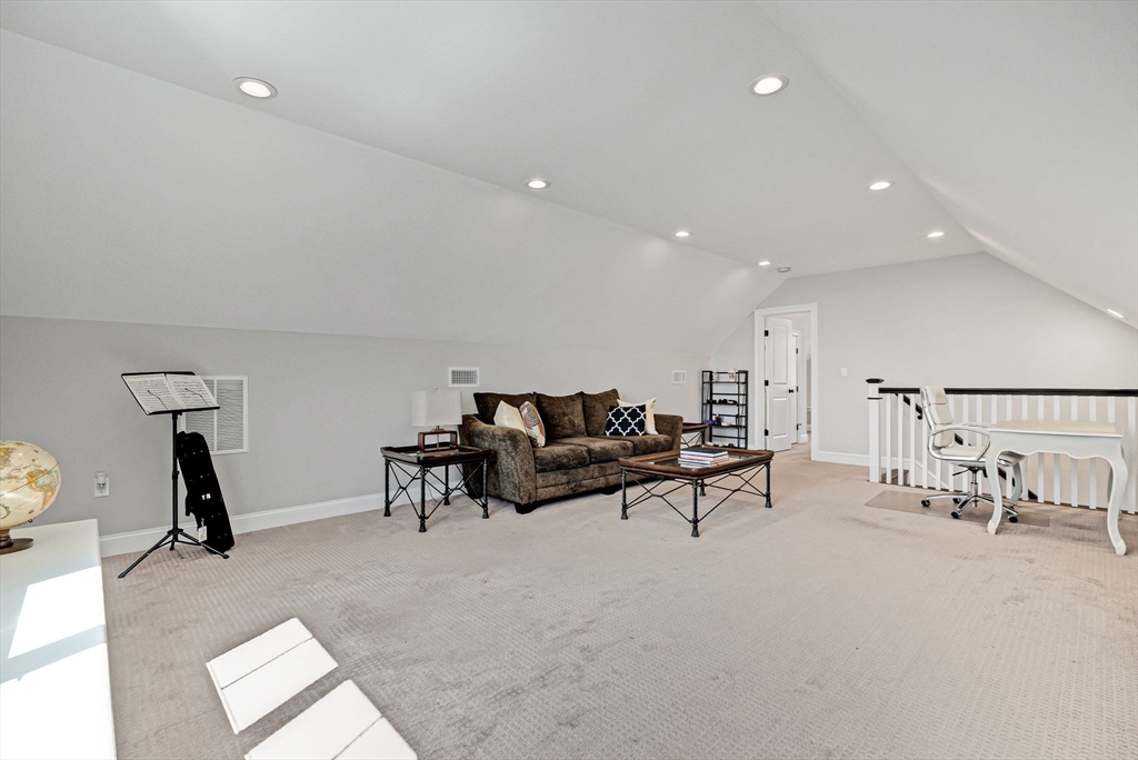 17 Sunrise Terrace Needham, MA 02492 - Photo 29 of 42 a living room with furniture and a flat screen tv