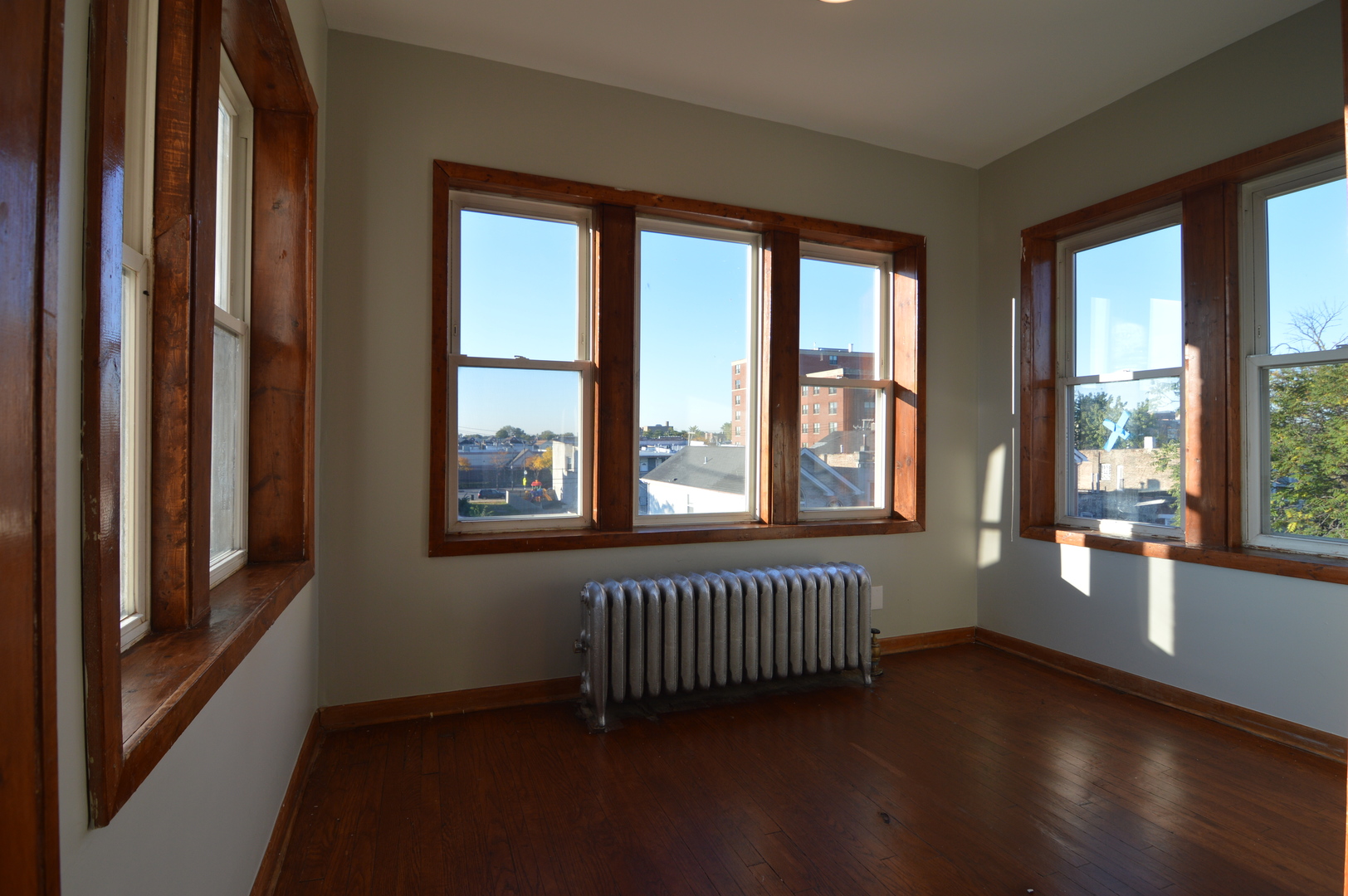 3422 West Grenshaw Street, Unit 2 Chicago, IL 60624 - Photo 3 of 12 a view of an empty room with a window