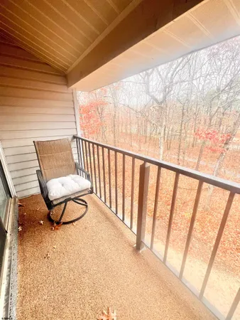 a view of a two chairs in the room