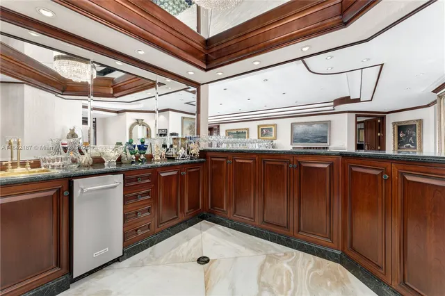 a view of living room and kitchen with furniture