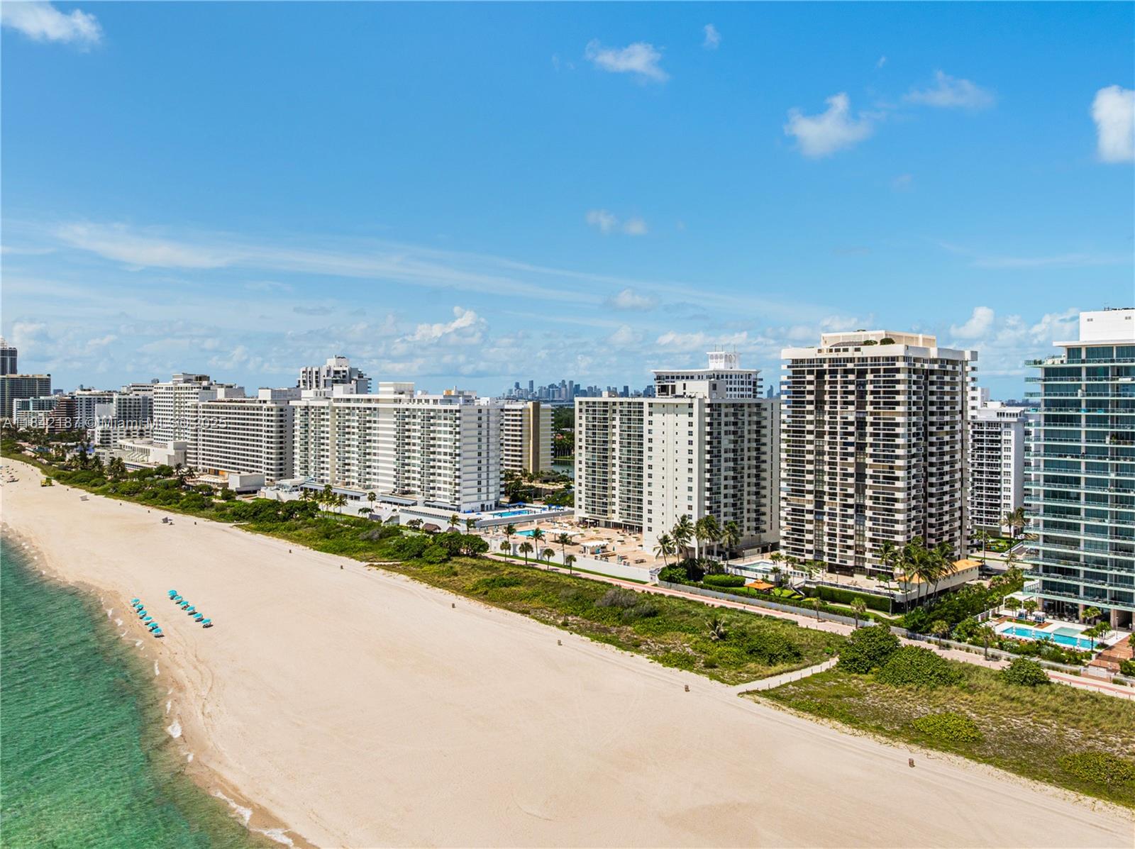5757 Collins Avenue, Unit PH4 Miami Beach, FL 33140 - Photo 24 of 27 a view of a city with tall buildings