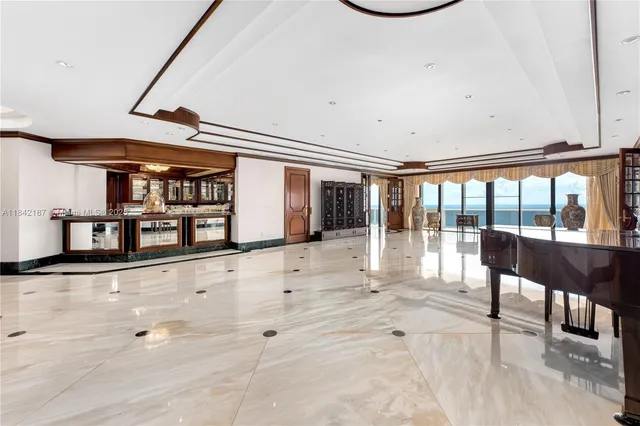 a view of a living room and entry way