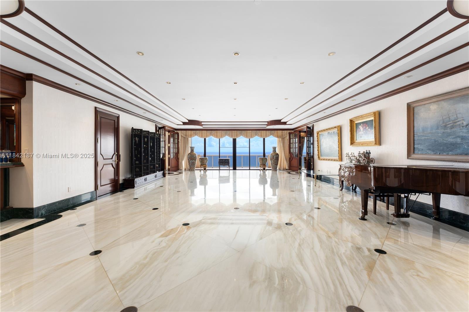 5757 Collins Avenue, Unit PH4 Miami Beach, FL 33140 - Photo 6 of 27 a view of a house with wooden floor