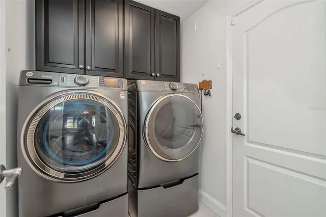 a kitchen with stainless steel appliances granite countertop a sink and stove
