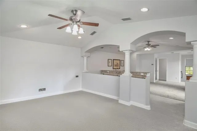 a view of a house and a yard in a back yard