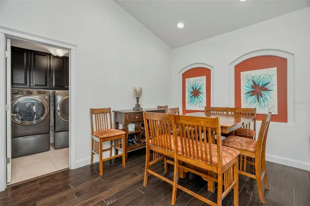 a living room with furniture rug and window
