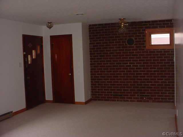 406 Beulah Road Sandston, VA 23150 - Photo 4 of 5 Other - A VIEW OF THE LIVING ROOM WITH THE BRICK A