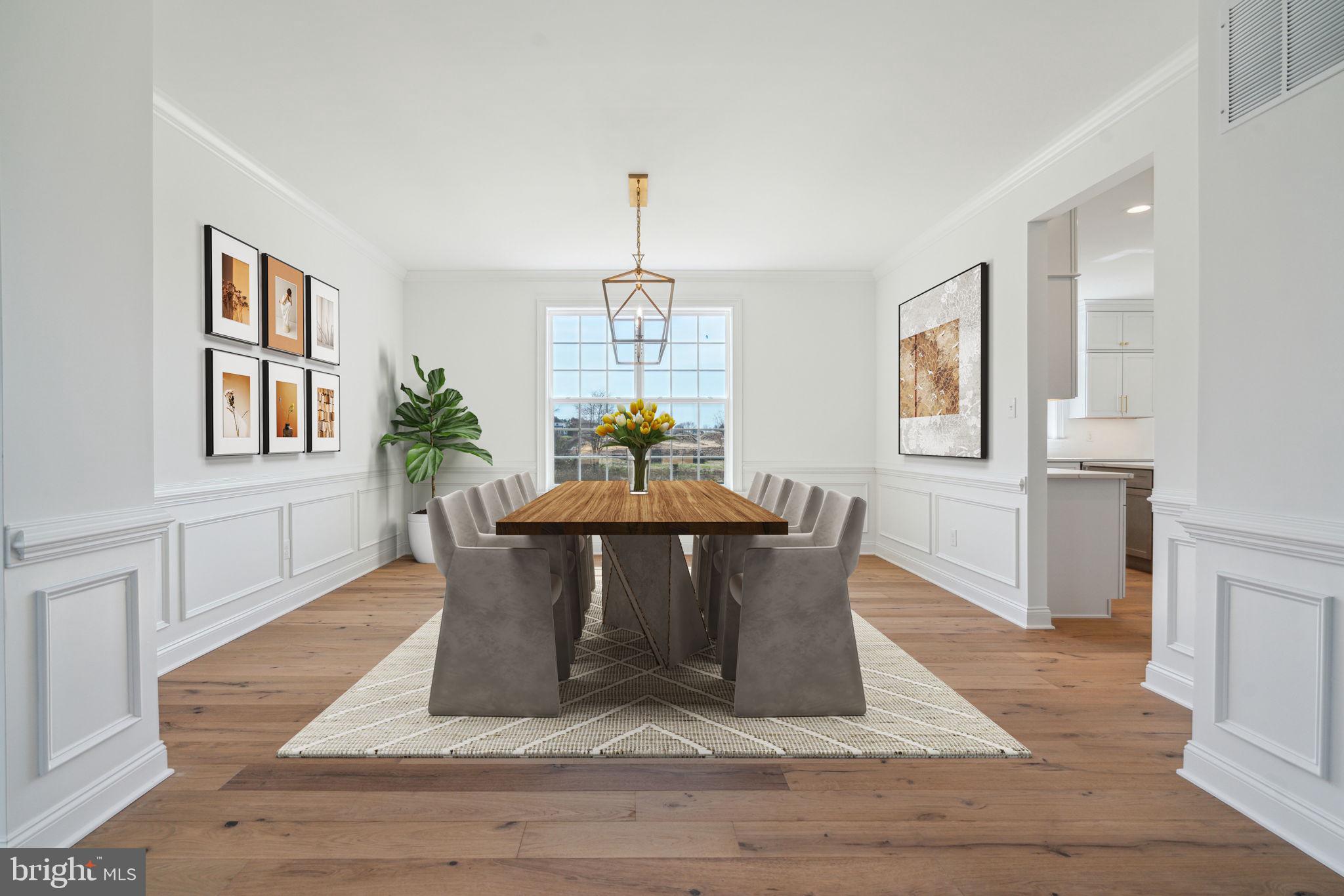 3 Pondview Court Monroeville, NJ 08343 - Photo 7 of 9 a dining room with chandelier and wooden floor