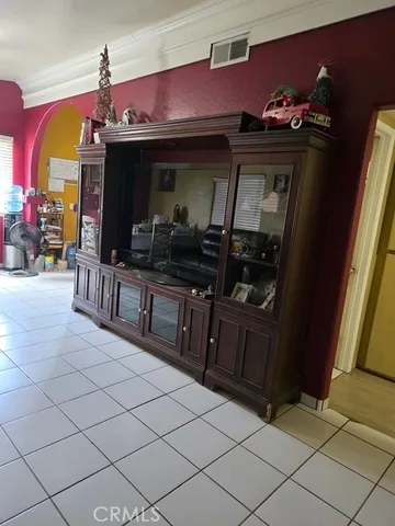 a kitchen with stainless steel appliances granite countertop a refrigerator and a stove