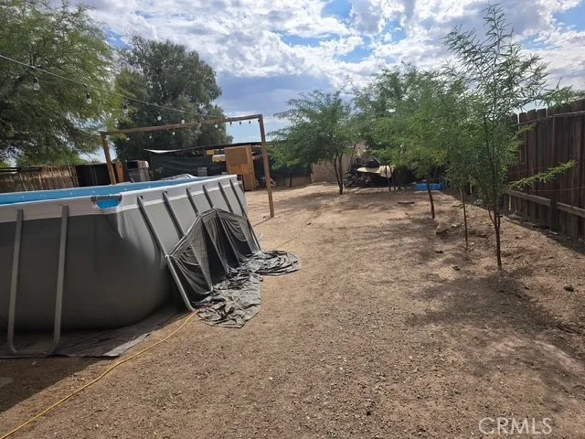 a view of backyard with deck