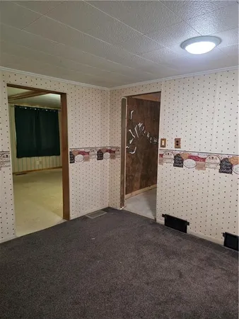 a view of a livingroom with a staircase