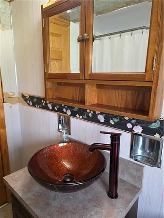 a view of a livingroom with washer and dryer