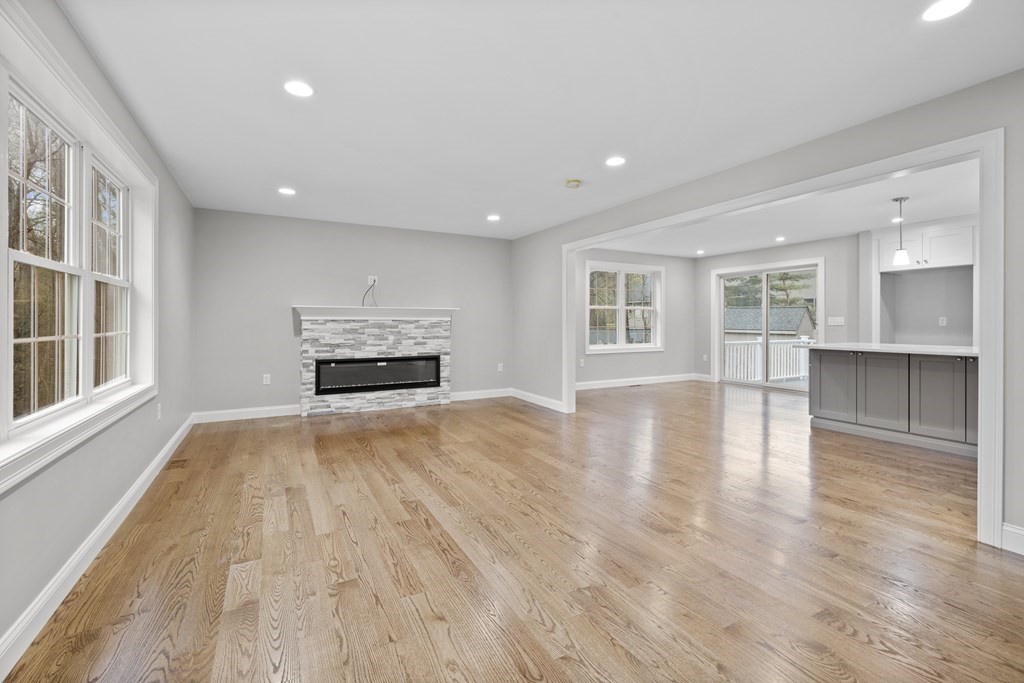48 Aldrich Road Wilmington, MA 01887 - Photo 12 of 42 a view of empty room with wooden floor and windows