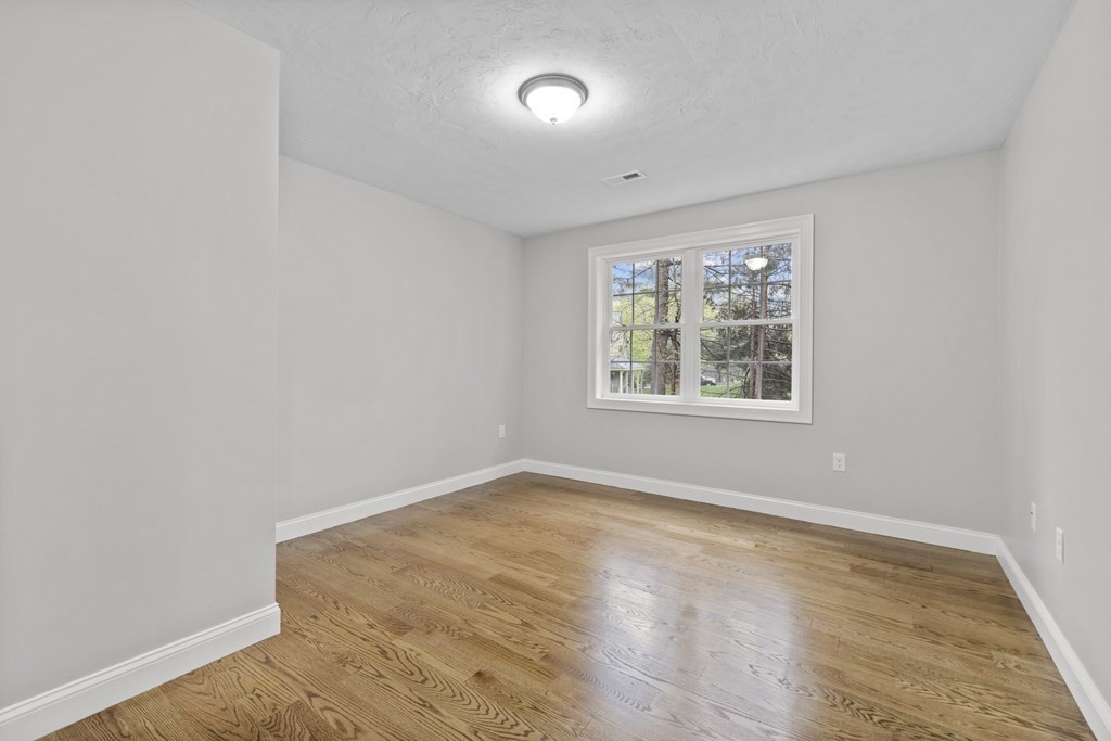 48 Aldrich Road Wilmington, MA 01887 - Photo 29 of 42 an empty room with windows and closet