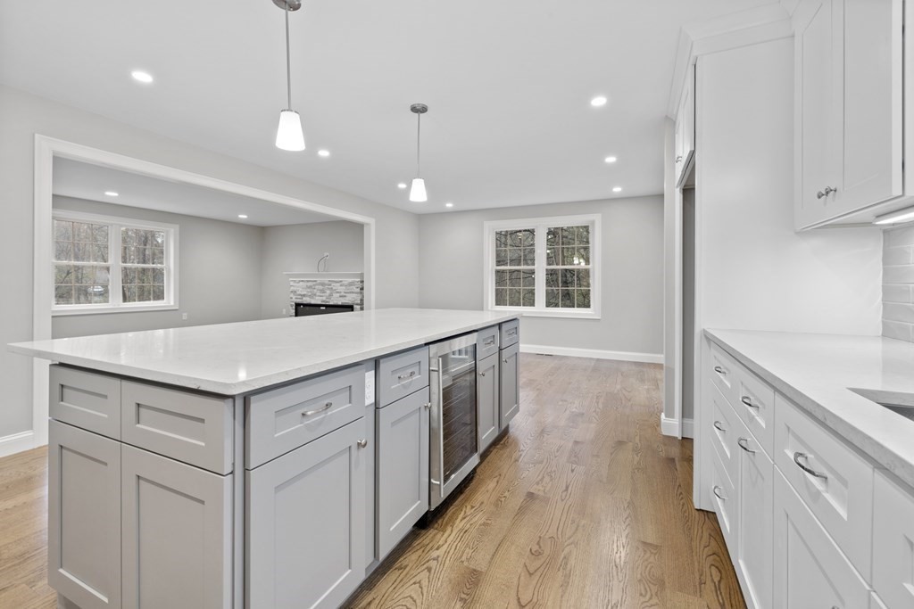 48 Aldrich Road Wilmington, MA 01887 - Photo 10 of 42 a kitchen with a stove sink and cabinets