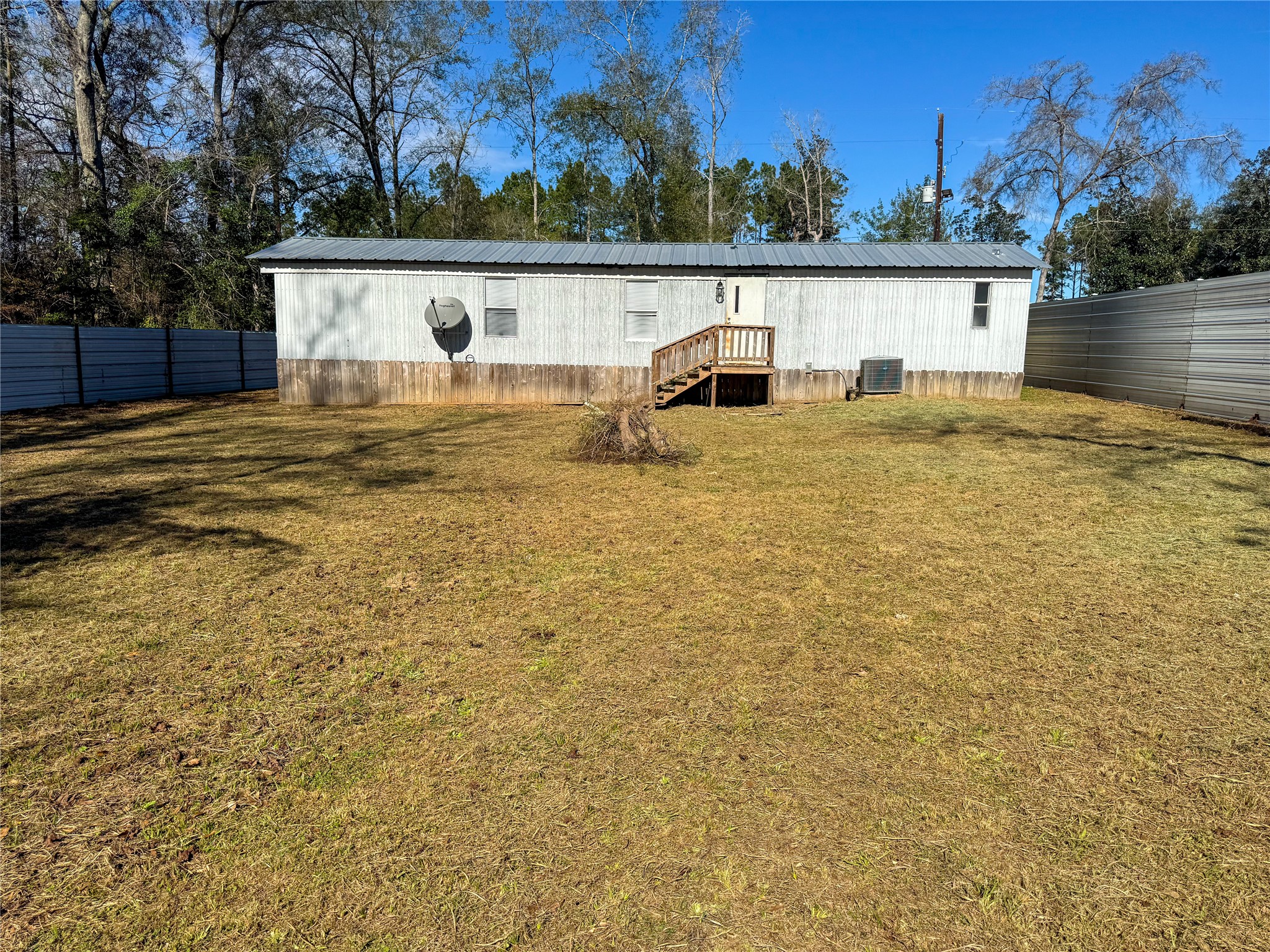 39 County Road 3478 Cleveland, TX 77327 - Photo 3 of 20 Big backyard